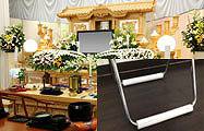 畳の部屋で行う葬儀にパイプ椅子用床保護カバーを使用